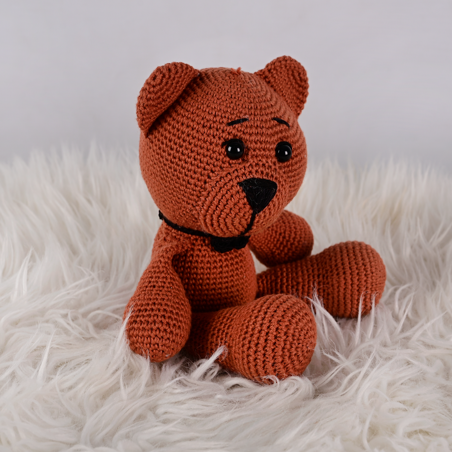 Oso con corbata negra