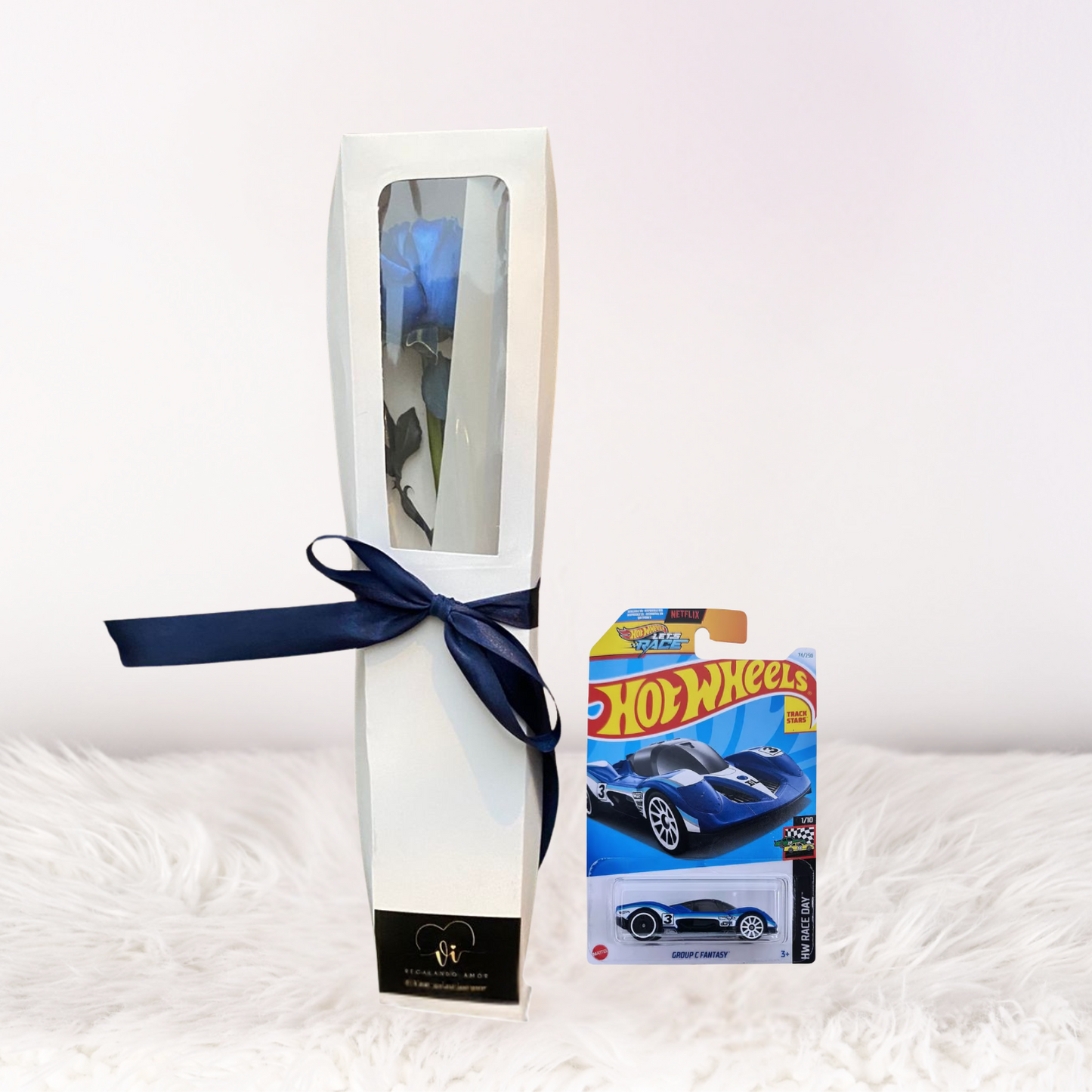 caja de 1 rosa azul + carrito hotweels
